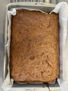 zucchini spice cake in a 9x13 pan