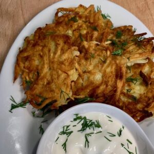 crispy golden potato pancakes with sour cream