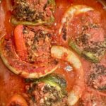 roasting pan of stuffed peppers