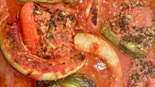 roasting pan of stuffed peppers