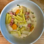 white bowl of potato, ham & yellow bean soup