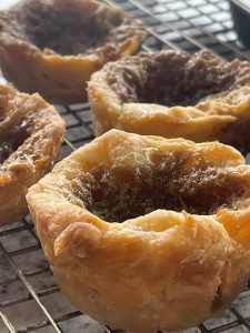 best butter tart recipe; 4 butter tarts on a cooling rack