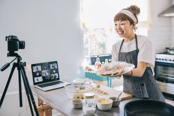 woman making dumplings online; best online team building
