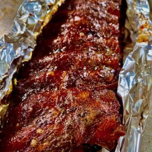Ribs; set in foil to rest with butter