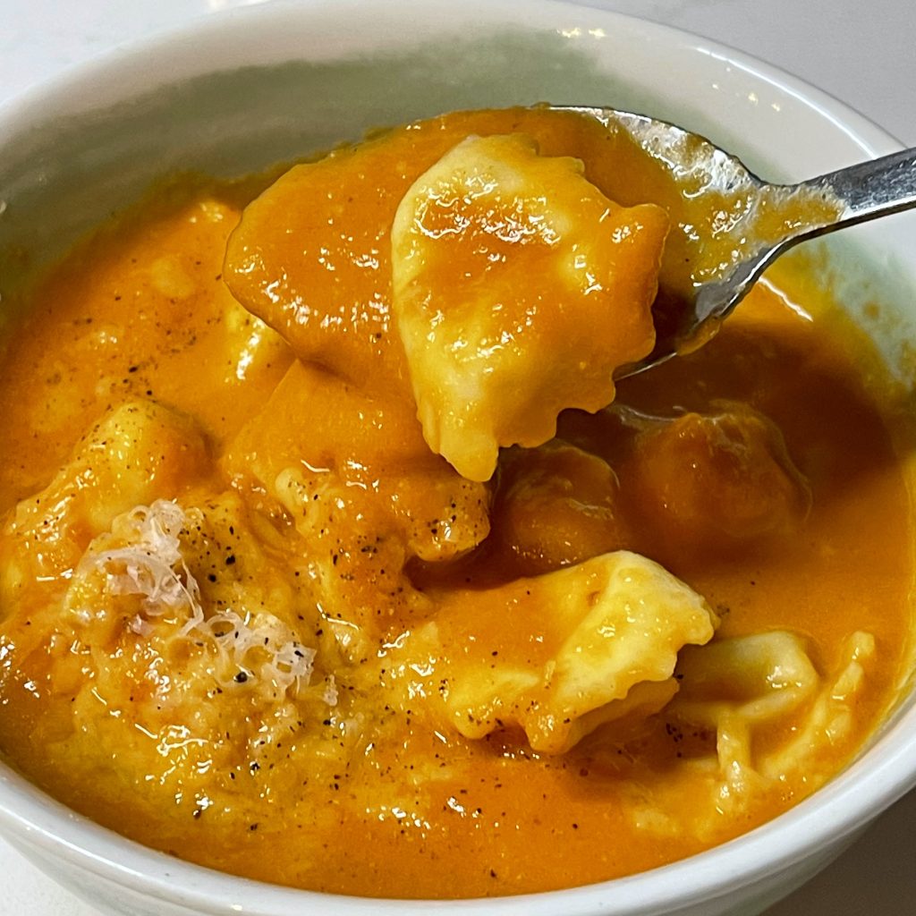 bowl of tomato tortellini soup