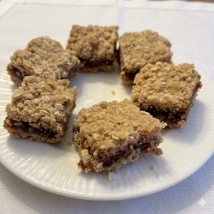 Date squares on a white plate