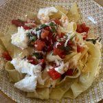 fresh pasta with sauce vierge, garnished with fresh mozzarella cheese