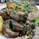 Pork Chops with creamy mushroom sauce and buttered noodles
